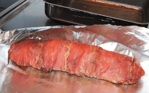 Linda in fläskfilén i dubbel aluminiumfolie